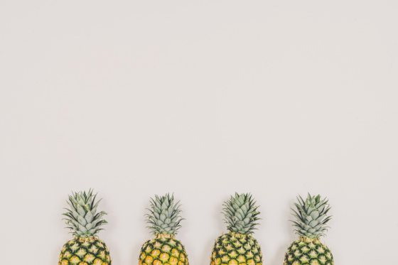 Four pineapples side by side